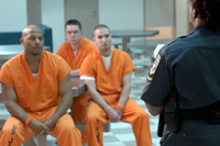 officer guarding inmates