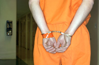 inmate in handcuffs