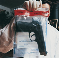 a pistol in an evidence bag