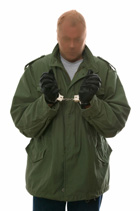 a person wearing a stocking over their head in handcuffs