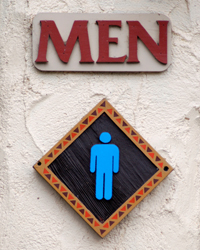 a sign for the Men's Room