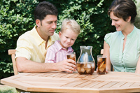 family drinking iced tea