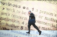 a person in a suit running with dictionary definition of business