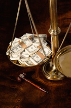 scales, a gavel and a stack of money
