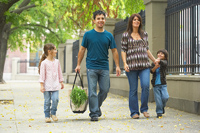 a person in a suit grasps another by the lapels